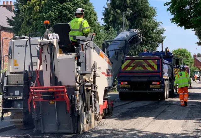 Resurfacing work on Station Road, Whittington, in June