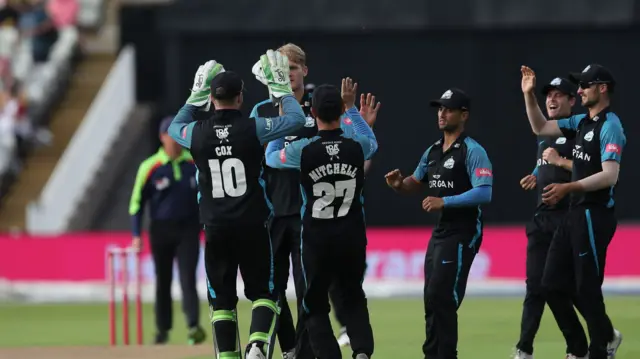 Dillon Pennington celebrates a Worcestershire wicket.