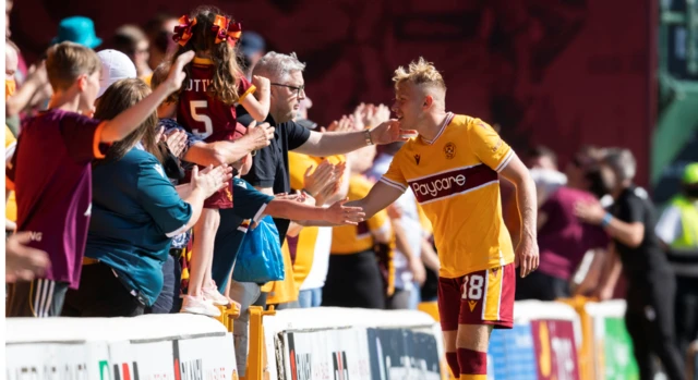 Motherwell's Dean Cornelius with fans at full time