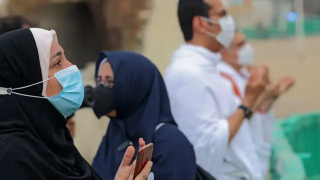 Muslim pilgrims pray near Mount Arafat, also known as Jabal al-Rahma (Mount of Mercy), near the holy city of Mecca