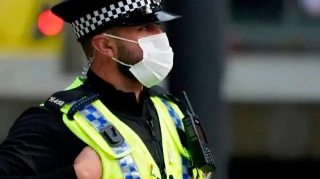 Police officer wearing a face mask