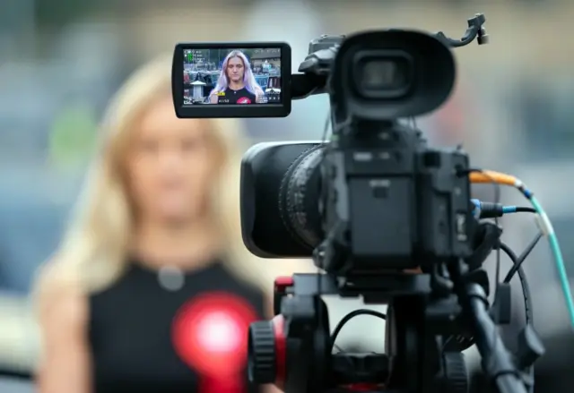 Kim Leadbeater being viewed through a camera lens