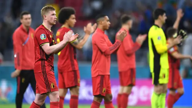 Belgium players react to defeat against Italy