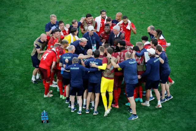 Swiss team huddle