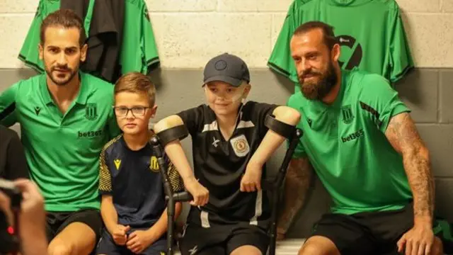 Ashton with a couple of Stoke City players