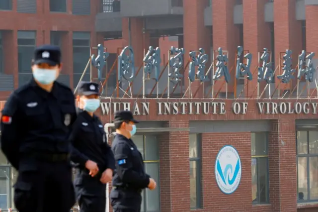 Security personnel outside Wuhan Institute of Virology