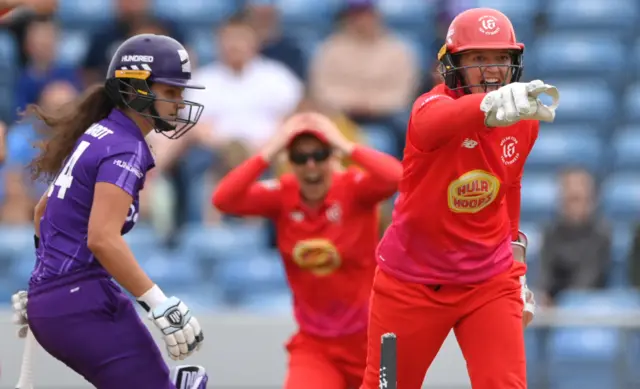 Sarah Taylor celebrates Wolvaardt's run out