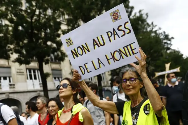 Demonstrators in Paris, 24 Jul 21