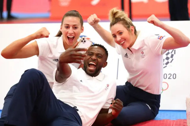 Mahama Cho with Bianca Walkden and Jade Jones.