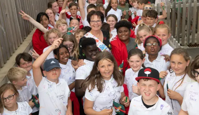 Gill Jackson pictured with pupils