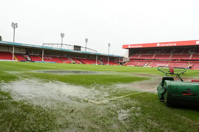 The waterlogged pitch at the Banks's Stadium