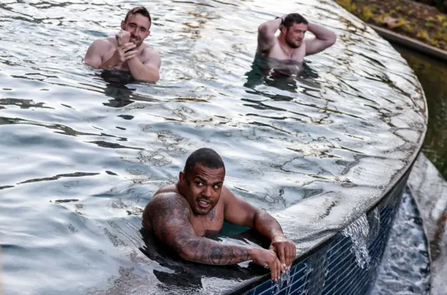 Kyle Sinckler in a swimming pool