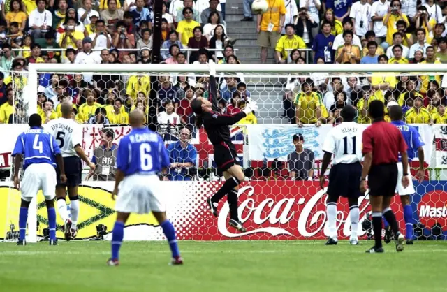 Ronaldinho scoring for Brazil against England at the 2002 World Cup