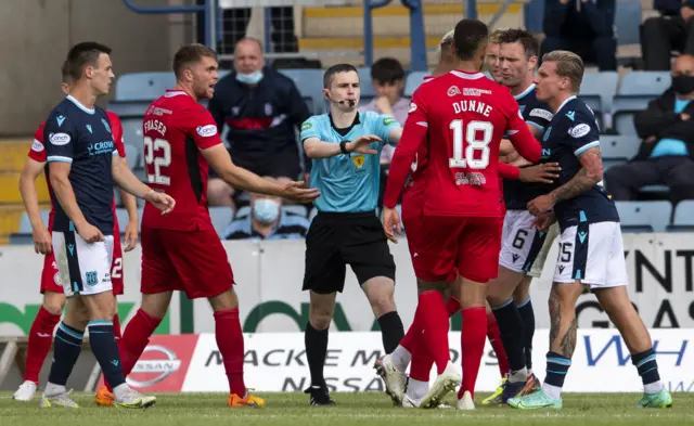 Referee Craig Napier was at the heart of the action at Dens Park