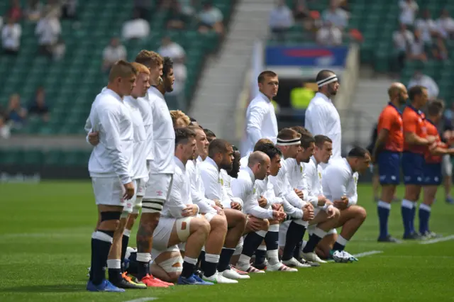 Some England players take a knee