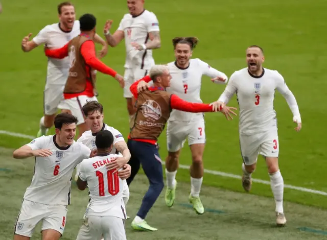 England players celebrate Raheem Sterling's goal against Germany