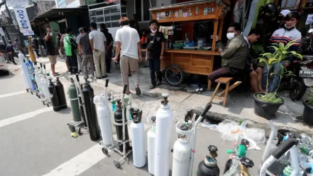 Oxygen tanks lined up in Jakarta