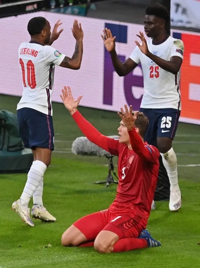 Sterling and Saka celebrate the leveller