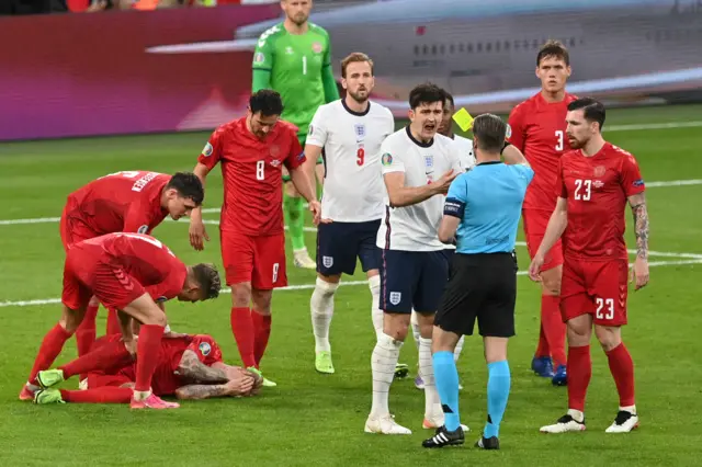 Harry Maguire receives a yellow card