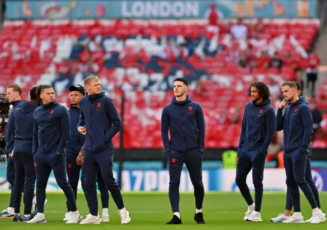 England players inspect the pitch before England v Denmark