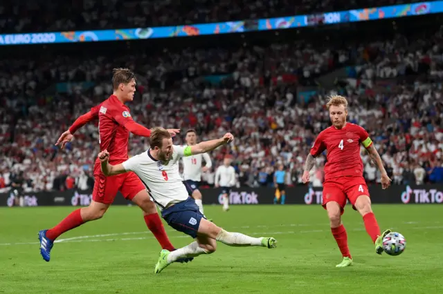 Harry Kane gets a shot away