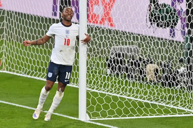 Raheem Sterling celebrates Simon Kjaer's own goal