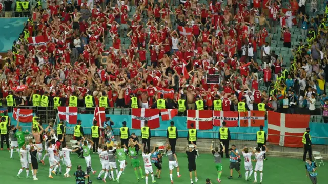 Denmark celebrate with their fans