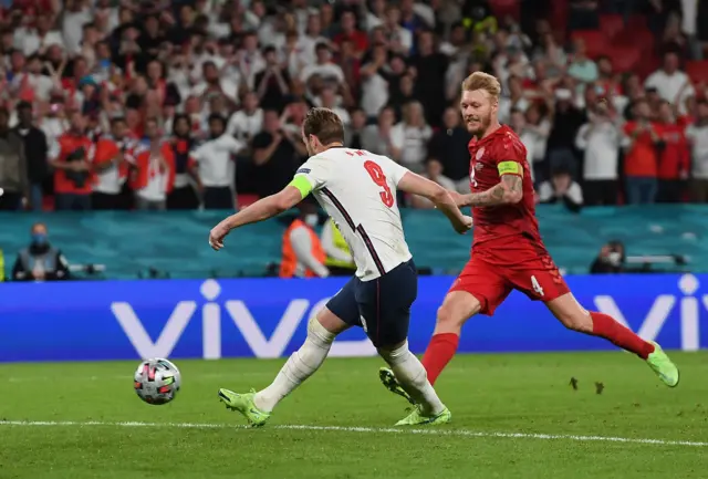Harry Kane scores the rebound from his missed penalty