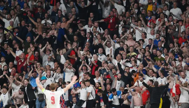 Harry Kane celebrates with the fans