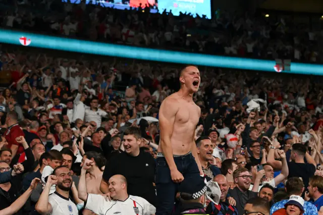 England fans celebrate Harry Kane's goal