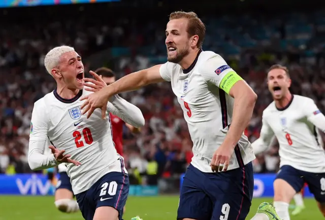 Harry Kane celebrates after scoring the winner