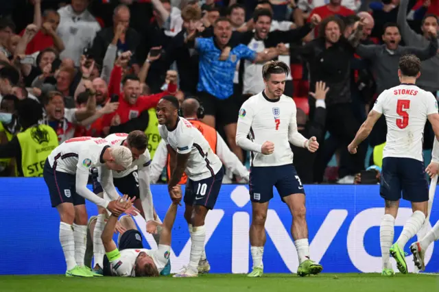 England celebrate a goal against Denmark