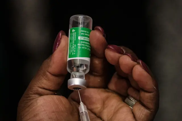 A nurse prepares an injection of a dose of the Oxford/AstraZeneca Covid-19 vaccine in Nairobi