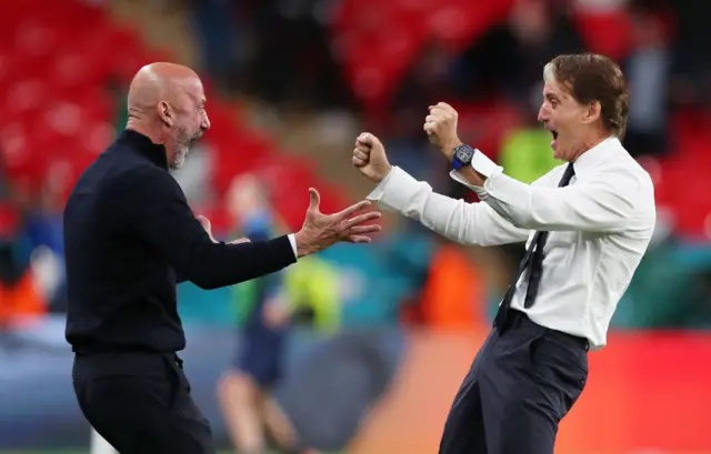 Roberto Mancini and Gianluca Vialli hugging after Italy beat Austria