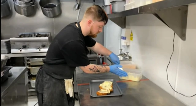 Chef making a parmo at The Open Jar