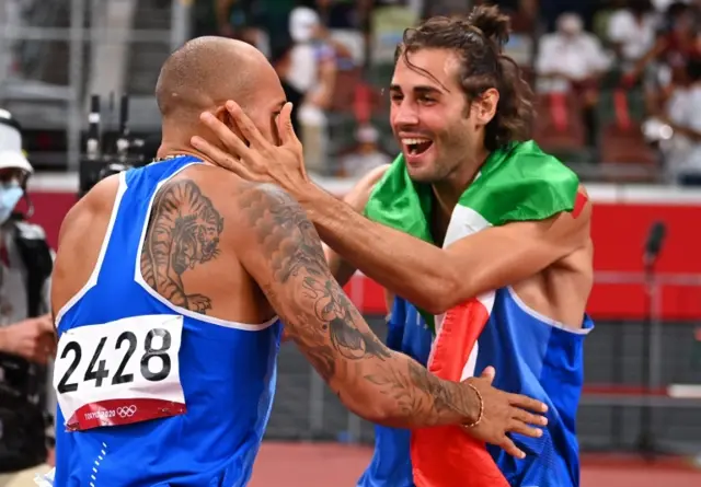 Lamont Marcell Jacobs celebrates winning Olympic gold with fellow Italian Gianmarco Tamberi