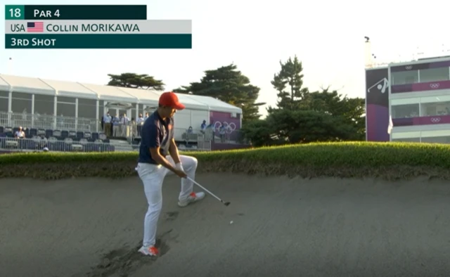 Collin Morikawa about to play out of a bunker during the Tokyo Olympics play-off