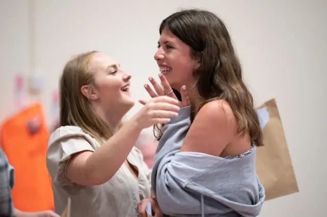 Pupils receive their GCSE results at Dorcon Academy in Swindon, Wiltshire