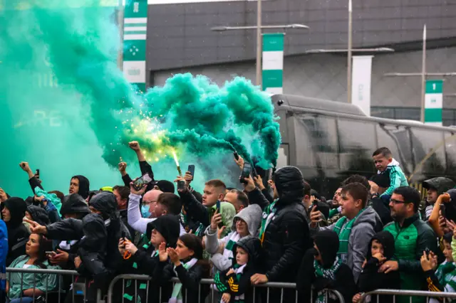 Celtic fans welcome the team to the stadium