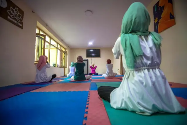 Women in a yoga class in Afghanistan