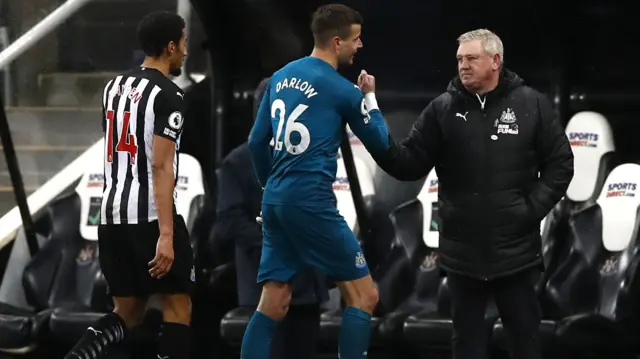 Steve Bruce clasps hands with Karl Darlow