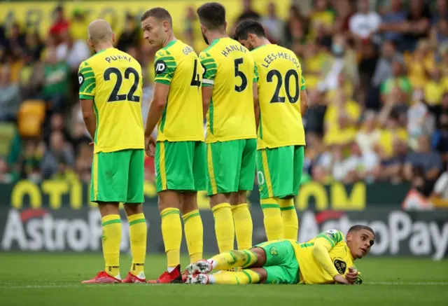 Norwich form a defensive wall against Liverpool