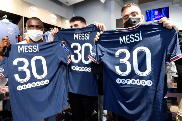 Fans with Messi shirts