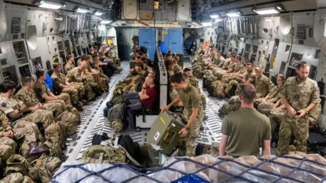 Armed forces seen inside aircraft