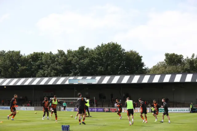 Dundee Utd warm up during the Premier Sports Cup round