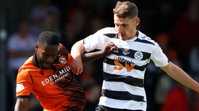 Dundee Utd's Jeando Fuchs and Ayr's Mark McKenzie