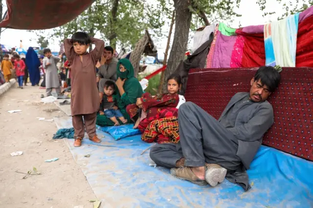 Internally displaced families from northern provinces, who fled from their homes due to the fighting between Taliban and Afghan security forces, take shelter in a public park in Kabul, Afghanistan