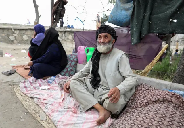 Internally displaced families from northern provinces, who fled from their homes due to the fighting between Taliban and Afghan security forces, take shelter in a public park in Kabul, Afghanistan, on 14 August 2021