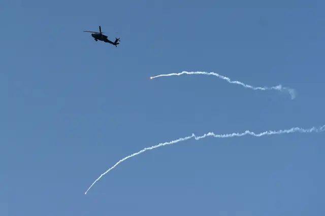 Helicopters are dropping flares to prevent rocket attacks