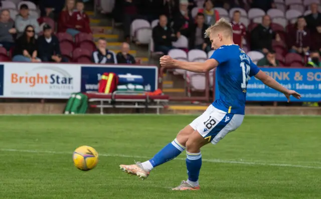 Ali McCann knocks in the winning spot-kick for St Johnstone